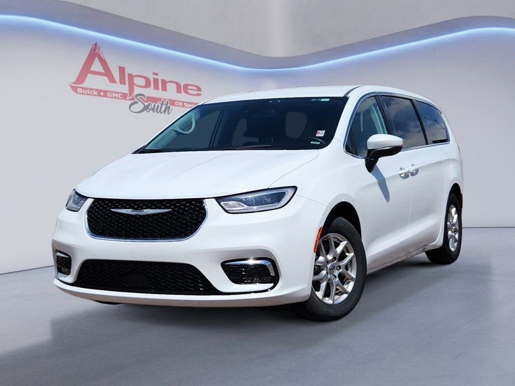 2023 Chrysler Pacifica Touring L in White — front three-quarter view