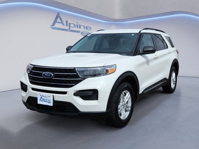 2023 Ford Explorer XLT in White Metallic — front three-quarter view